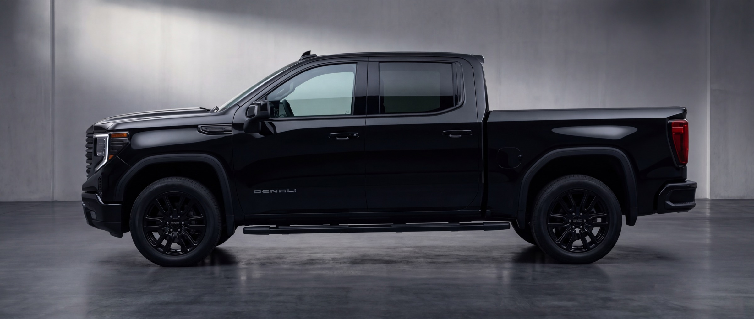 Black GMC Sierra Denali with tinted windows